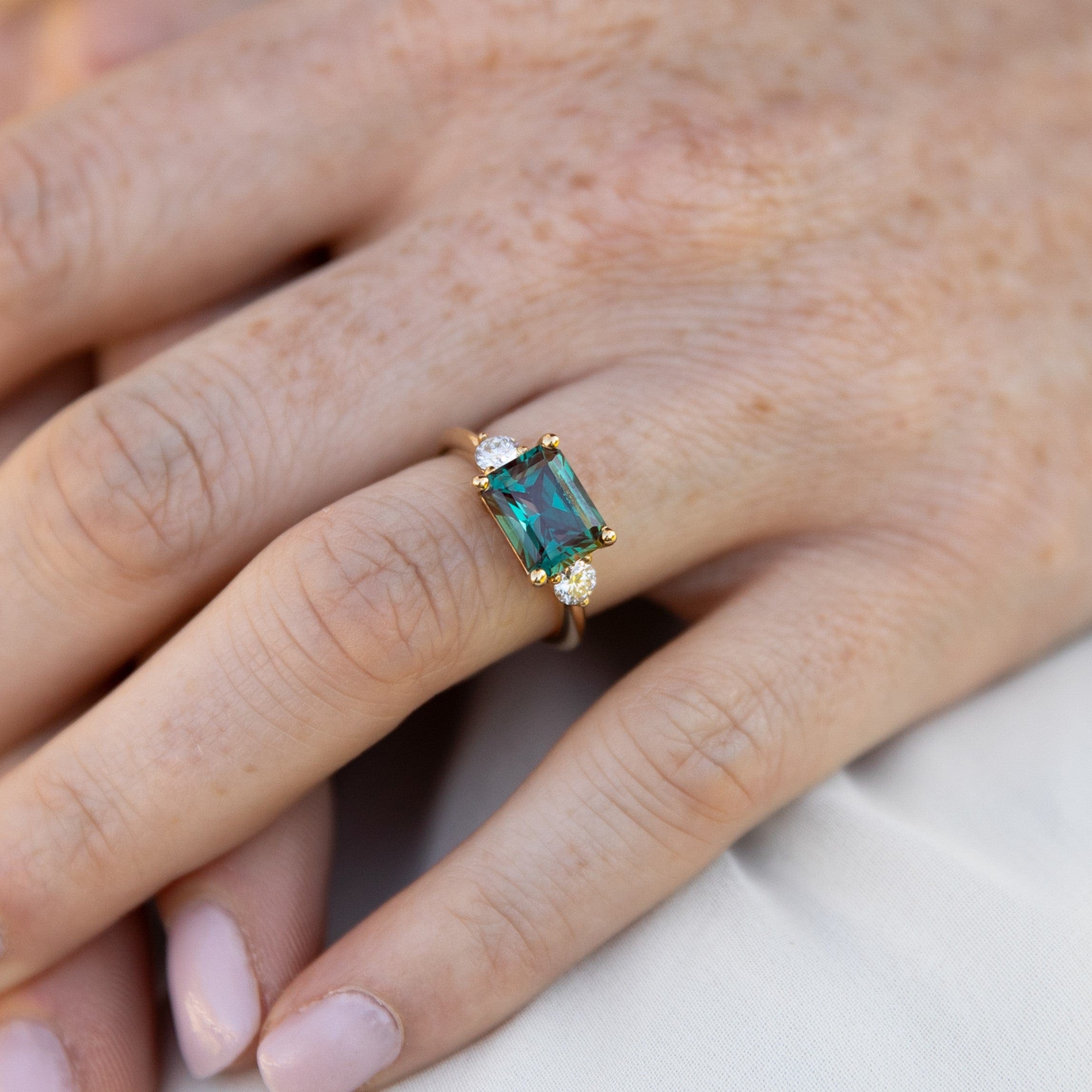 east-west-alexandrite-diamond-engagement-ring-yellow-gold