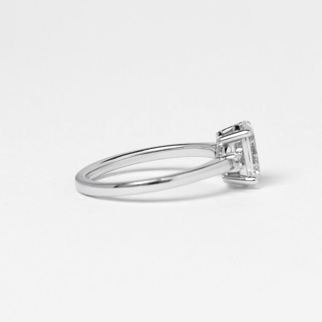 oval moissanite trilogy engagement ring white gold