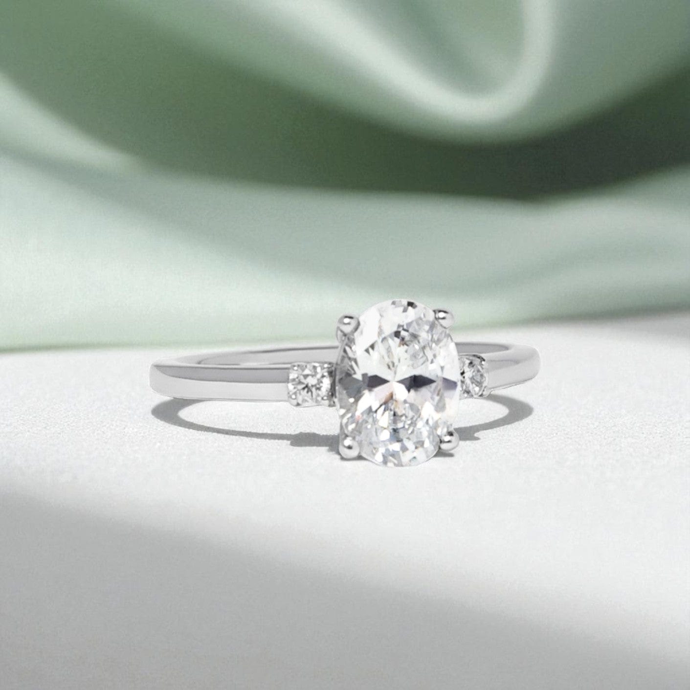 oval-moissanite-trilogy-engagement-ring-white-gold