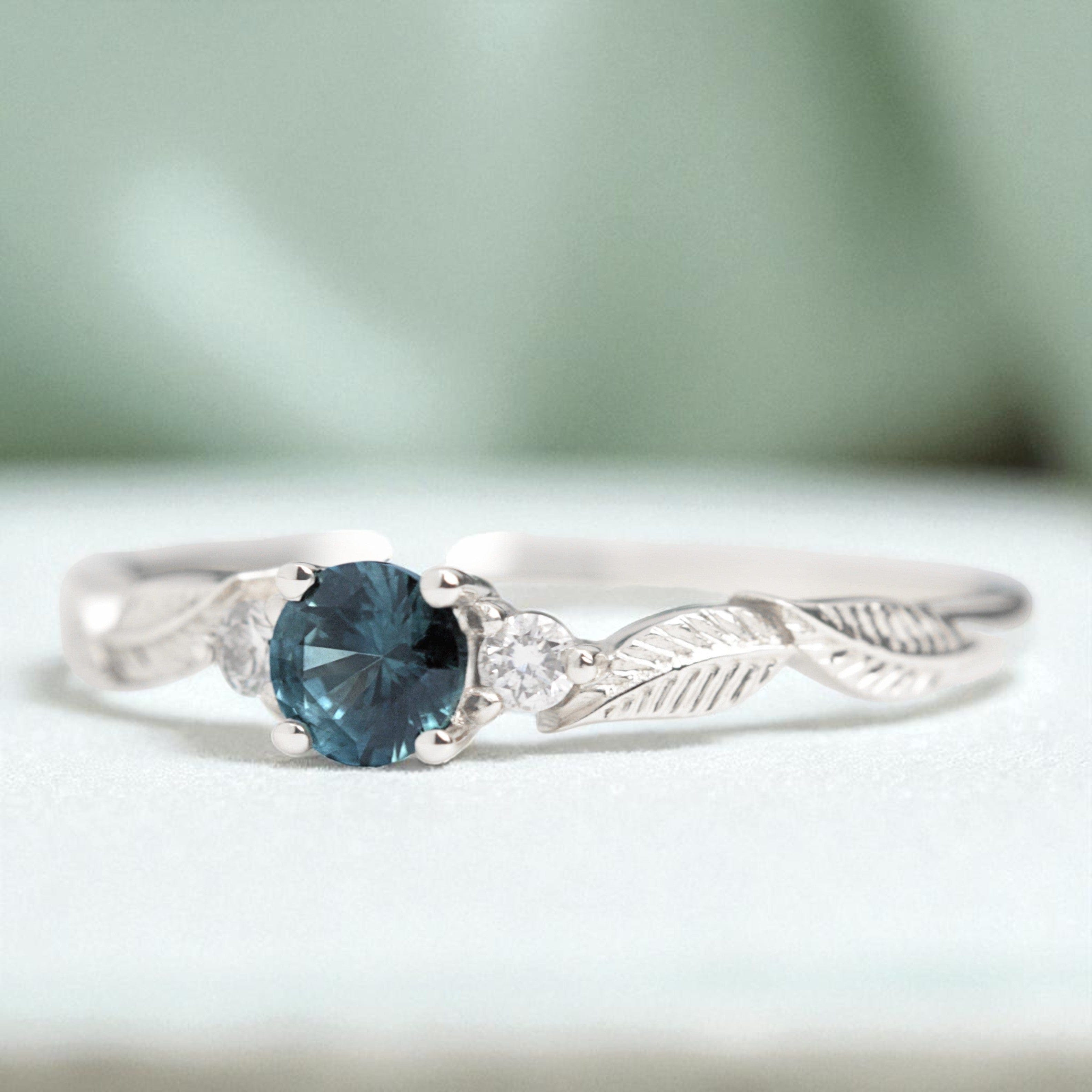 teal-sapphire-diamond-leaf-engagement-ring-white-gold