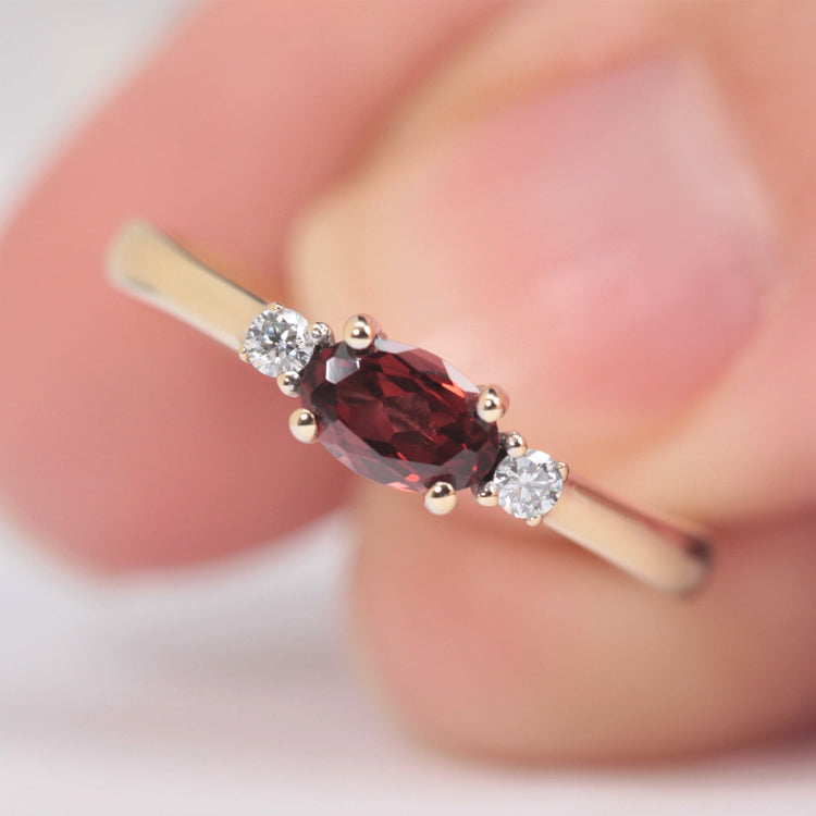garnet and diamond engagement ring in yellow gold
