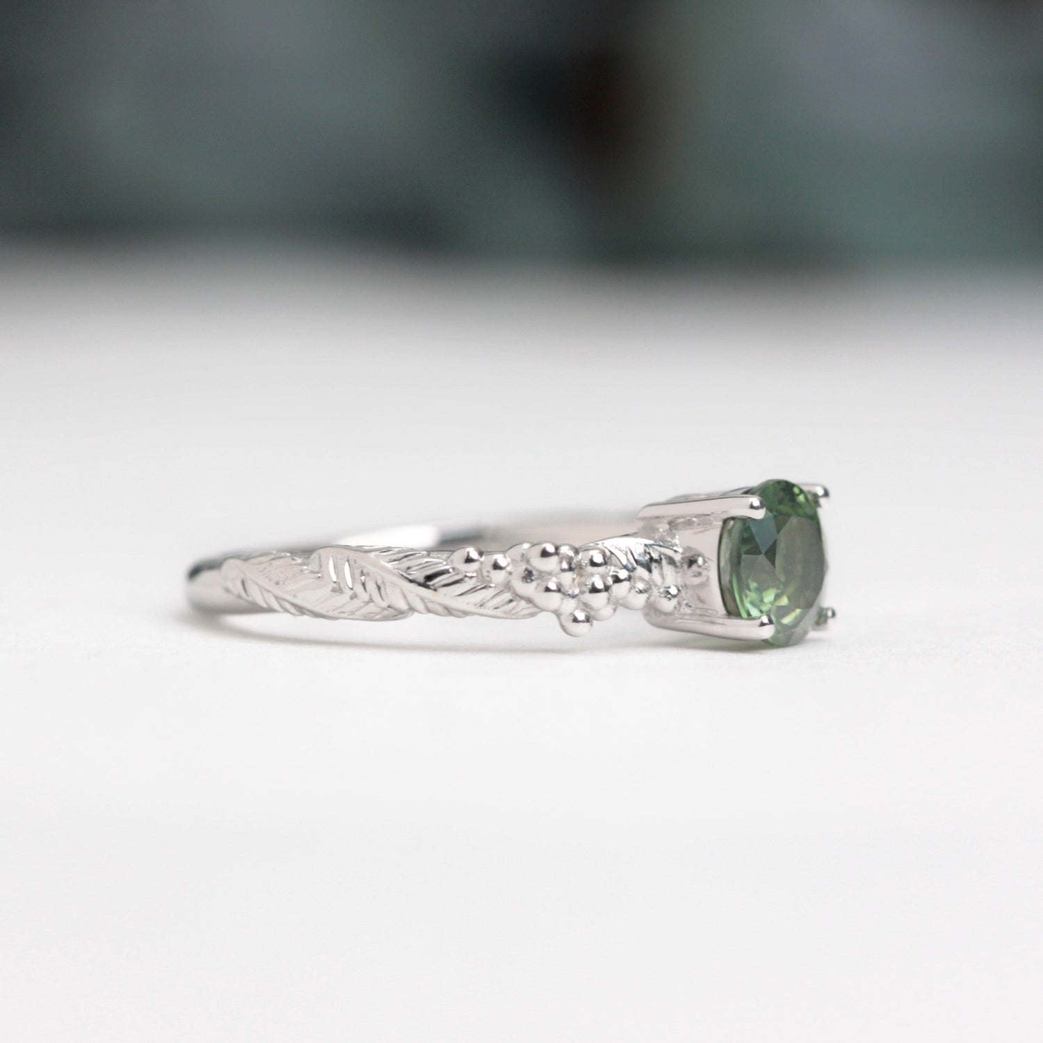 green sapphire wattle leaf engagement ring white gold