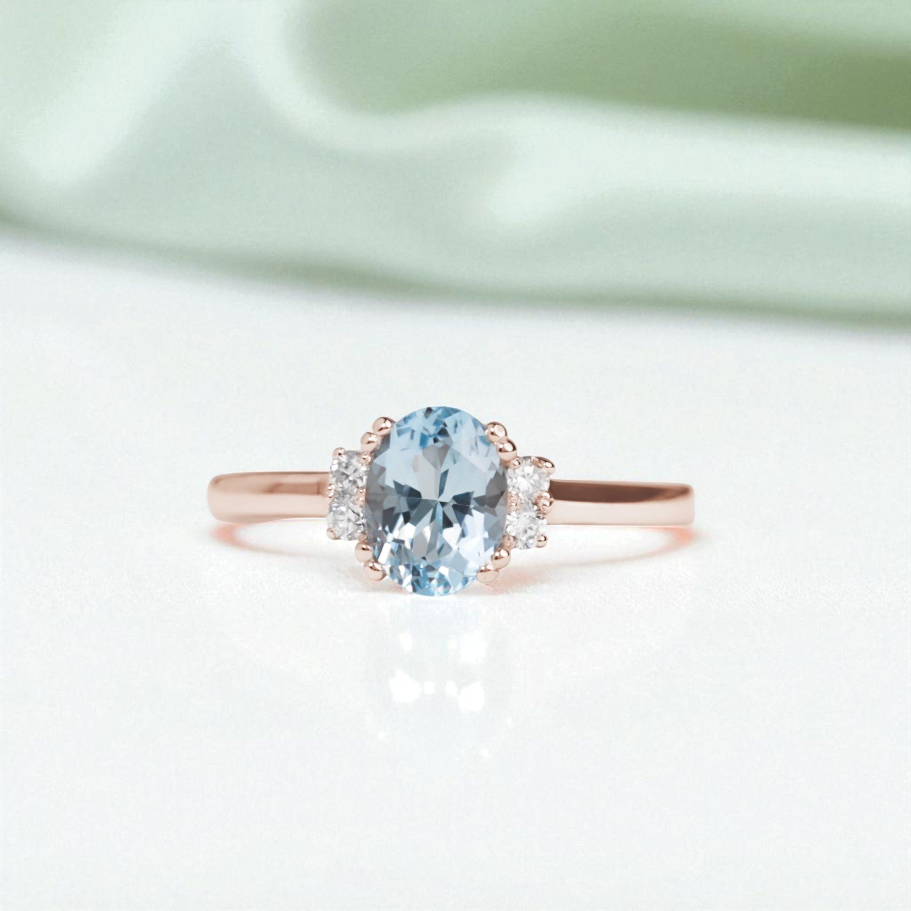 oval aquamarine diamond engagement ring rose gold