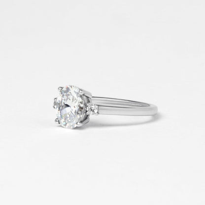 oval moissanite trilogy engagement ring white gold